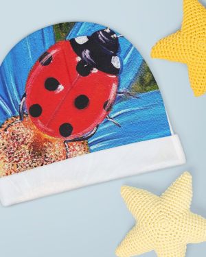 Colorful Ladybug Baby Beanie – designed by Antigua artist Edison Liburd